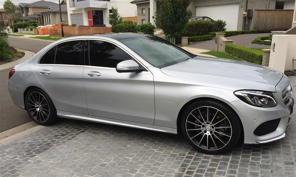 smash and grab tinting on mercedes sedan